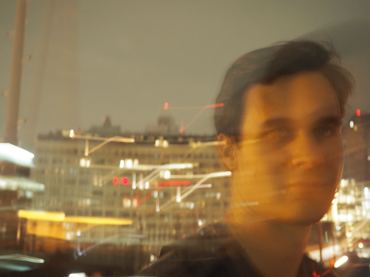 An artistic picture of me on the Brooklyn Bridge, shot in the summer of 2016